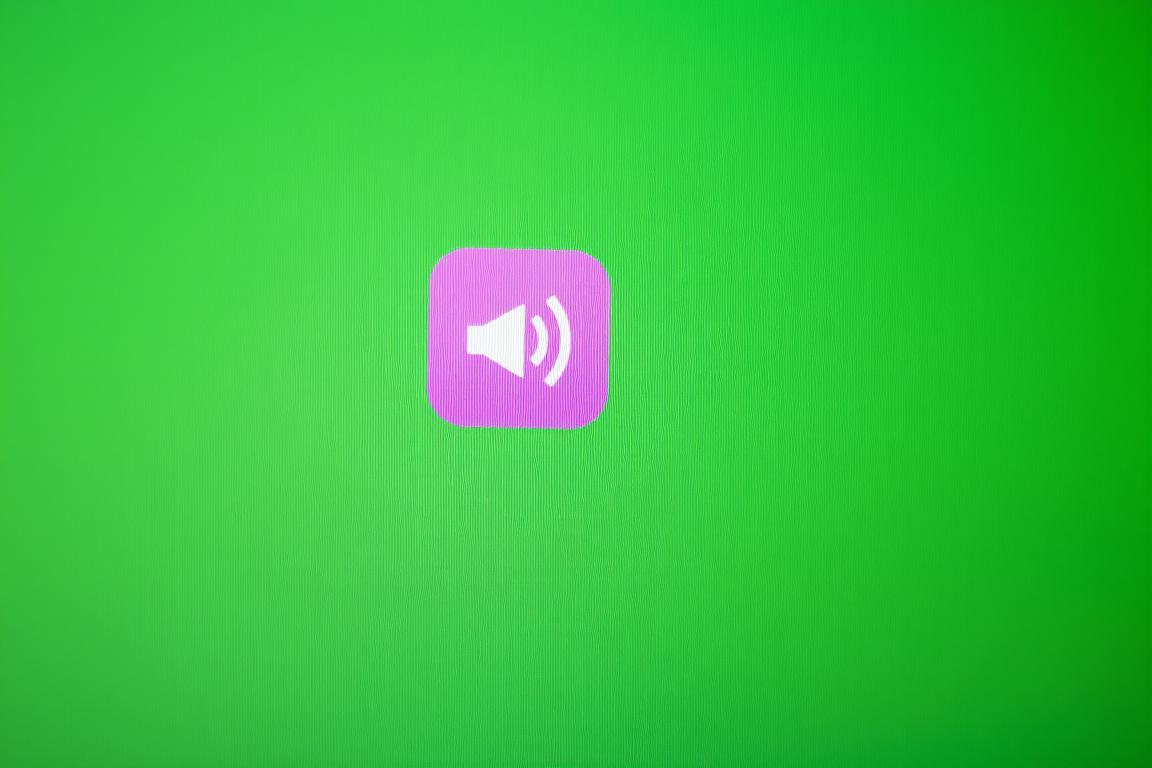 Ein Bild von einem Computer mit einem Lautsprechersymbol in der Taskleiste